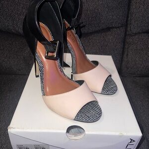 Aldo Black and Cream Heels